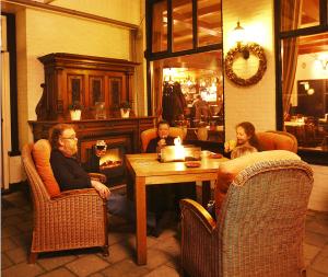 Posezení v ubytování Hotel Cafe Restaurant Duinzicht