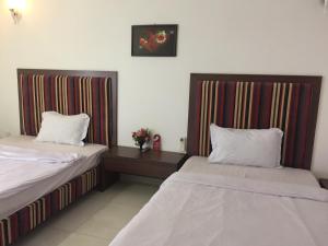 Postel nebo postele na pokoji v ubytování DaNa Home Hotel - Apartment