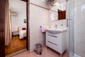 Koupelna v ubytování Rooms Stefania