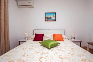 Postel nebo postele na pokoji v ubytování Rooms Stefania