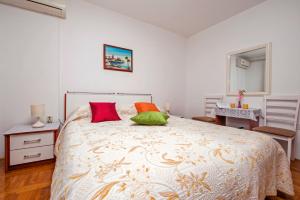 Postel nebo postele na pokoji v ubytování Rooms Stefania