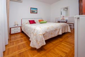 Postel nebo postele na pokoji v ubytování Rooms Stefania