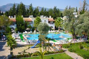 an image of a resort with a swimming pool at Toloman Hotel Bitez Beach in Bitez