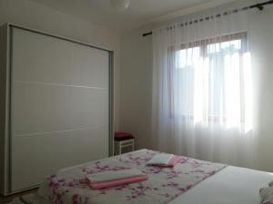 Postel nebo postele na pokoji v ubytování Guest House Konak kod Danke