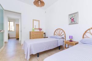 Posteľ alebo postele v izbe v ubytovaní Serra degli Angeli by BarbarHouse + 11 fotografií
