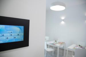 TV a/nebo společenská místnost v ubytování Al Duomo B&B