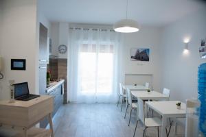 TV a/nebo společenská místnost v ubytování Al Duomo B&B
