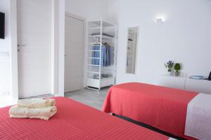 Postel nebo postele na pokoji v ubytování Al Duomo B&B