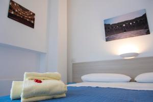 Postel nebo postele na pokoji v ubytování Al Duomo B&B