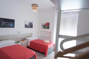 Postel nebo postele na pokoji v ubytování Al Duomo B&B