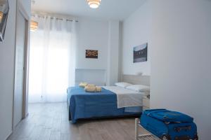 Postel nebo postele na pokoji v ubytování Al Duomo B&B