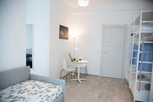 Postel nebo postele na pokoji v ubytování Al Duomo B&B
