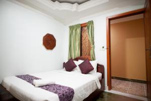 Letto o letti in una camera di RS II Guesthouse