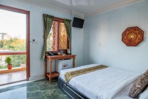 Letto o letti in una camera di RS II Guesthouse