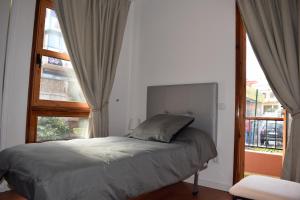 Postel nebo postele na pokoji v ubytování Apartamento San Isidro