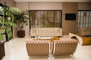 Area soggiorno di Class Hotel Rio Claro