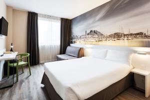 Postel nebo postele na pokoji v ubytování B&B HOTEL Alicante