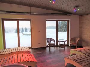 Posezení v ubytování EA Horský Hotel Hájenka