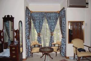 Area soggiorno di Falcon Crest Suites