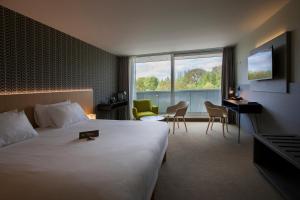 Postel nebo postele na pokoji v ubytování ibis Styles Kortrijk Expo