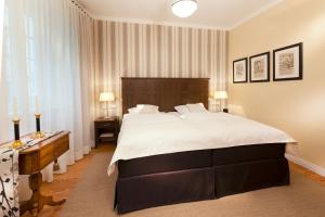 Postel nebo postele na pokoji v ubytování Boutique-Hotel Moseltor
