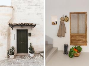 a door and a coat hanging on a wall at Angolo del Poeta - Maison de Charme in Matera