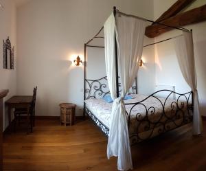Cama ou camas em um quarto em La Fromagerie