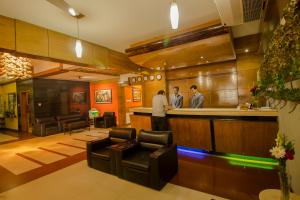 Ο χώρος του λόμπι ή της ρεσεψιόν στο Rafflesia Serviced Apartments