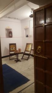Posezení v ubytování Hari Niwas Guest House