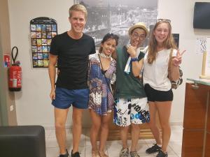 a group of four people posing for a picture at Backpackers Chez Patrick in Nice