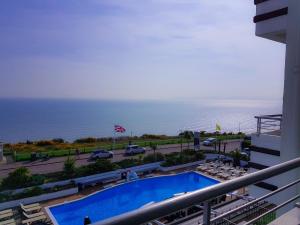 a view of the ocean from a hotel balcony at Cumberland Hotel - OCEANA COLLECTION in Bournemouth
