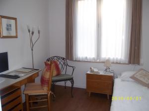 Postelja oz. postelje v sobi nastanitve Hotel Arcadia