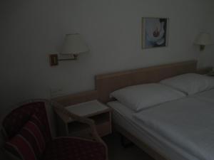 Postelja oz. postelje v sobi nastanitve Hotel Arcadia