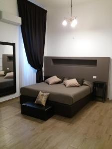 Postel nebo postele na pokoji v ubytování B&B LEI