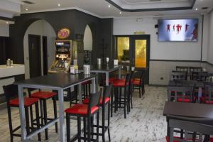 Reštaurácia alebo iné gastronomické zariadenie v ubytovaní Hostal Restaurante Central
