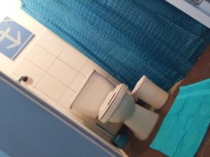 Un baño de Acuarela Hostal 37 fotos más