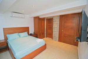 Postel nebo postele na pokoji v ubytování Palmetto Hotel