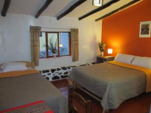 Letto o letti in una camera di Killari B&B