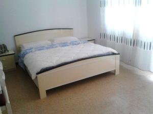 Postel nebo postele na pokoji v ubytování Residence Rotonda