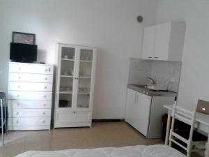 Kuchyň nebo kuchyňský kout v ubytování Residence Rotonda