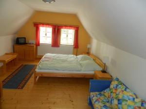 Postel nebo postele na pokoji v ubytování Hospoda na Peci