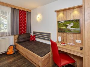 Łóżko lub łóżka w pokoju w obiekcie Hotel Gundolf