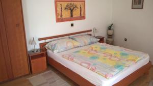 Giường trong phòng chung tại Ria Panzio