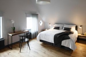 Postel nebo postele na pokoji v ubytování Zoltners Hotel