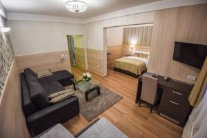 Postel nebo postele na pokoji v ubytování Hotel Požega