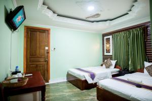 Letto o letti in una camera di RS II Guesthouse