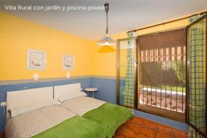 Łóżko lub łóżka w pokoju w obiekcie Villa Loma Linda