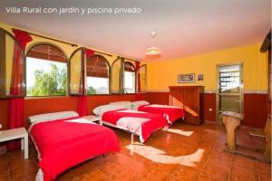 Łóżko lub łóżka w pokoju w obiekcie Villa Loma Linda