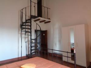 Postel nebo postele na pokoji v ubytování Agriturismo Podere Sant' Antonio