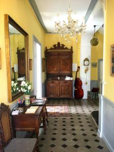 Posezení v ubytování La Maison des Palmiers